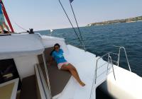 girl on sailing yacht stern